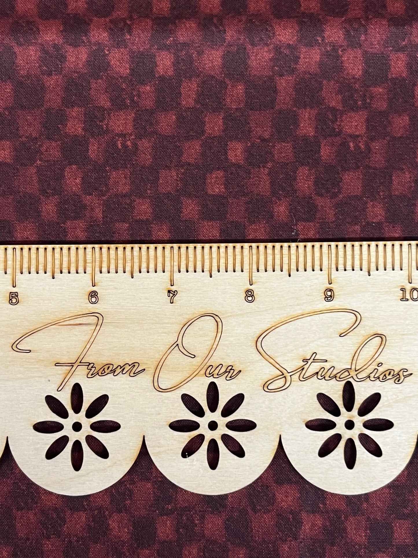 close up of reddish and rust check fabric perfect for junk journals