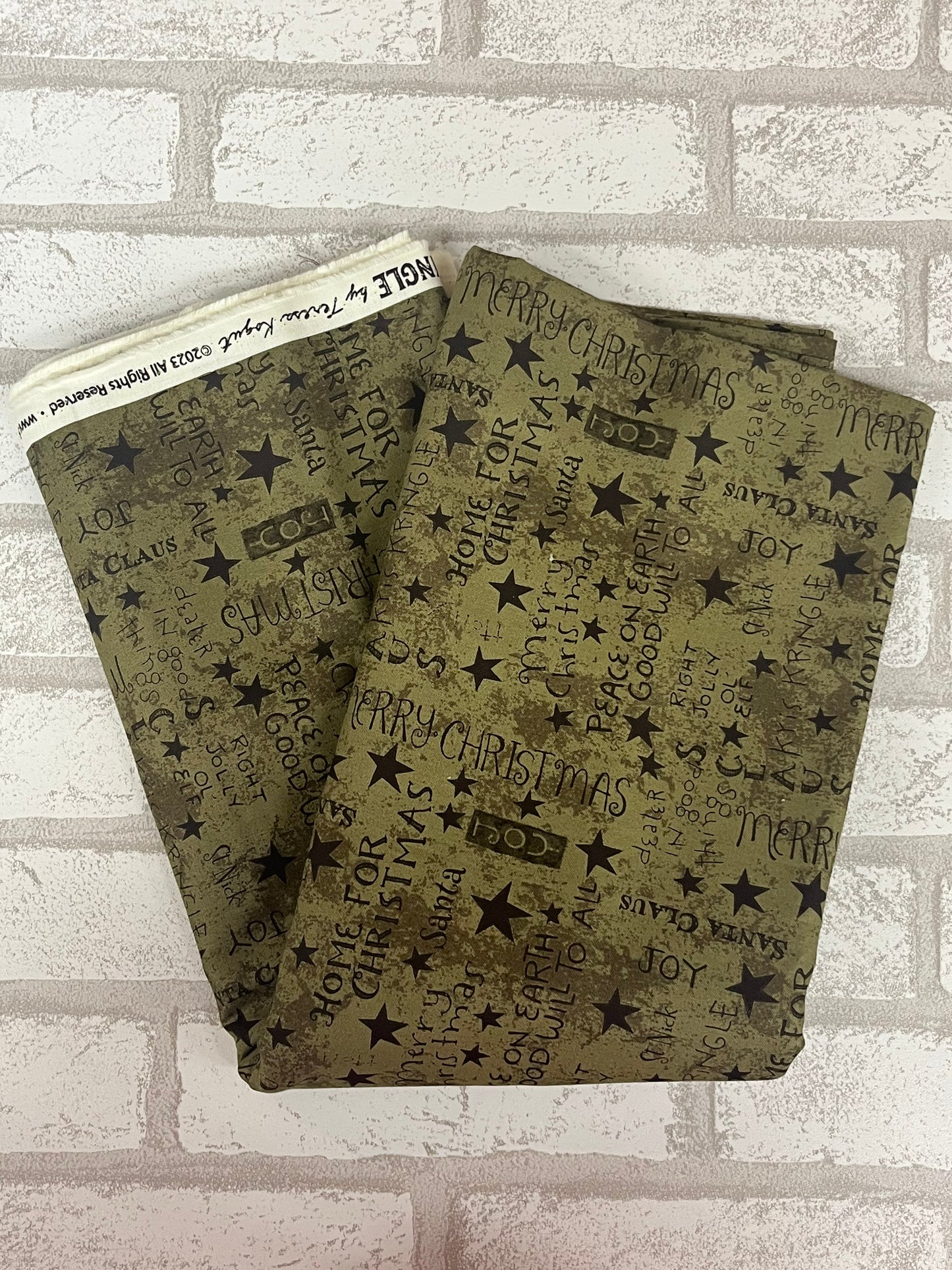 Green Riley Blake fabric fat quarter with Christmas sentiments