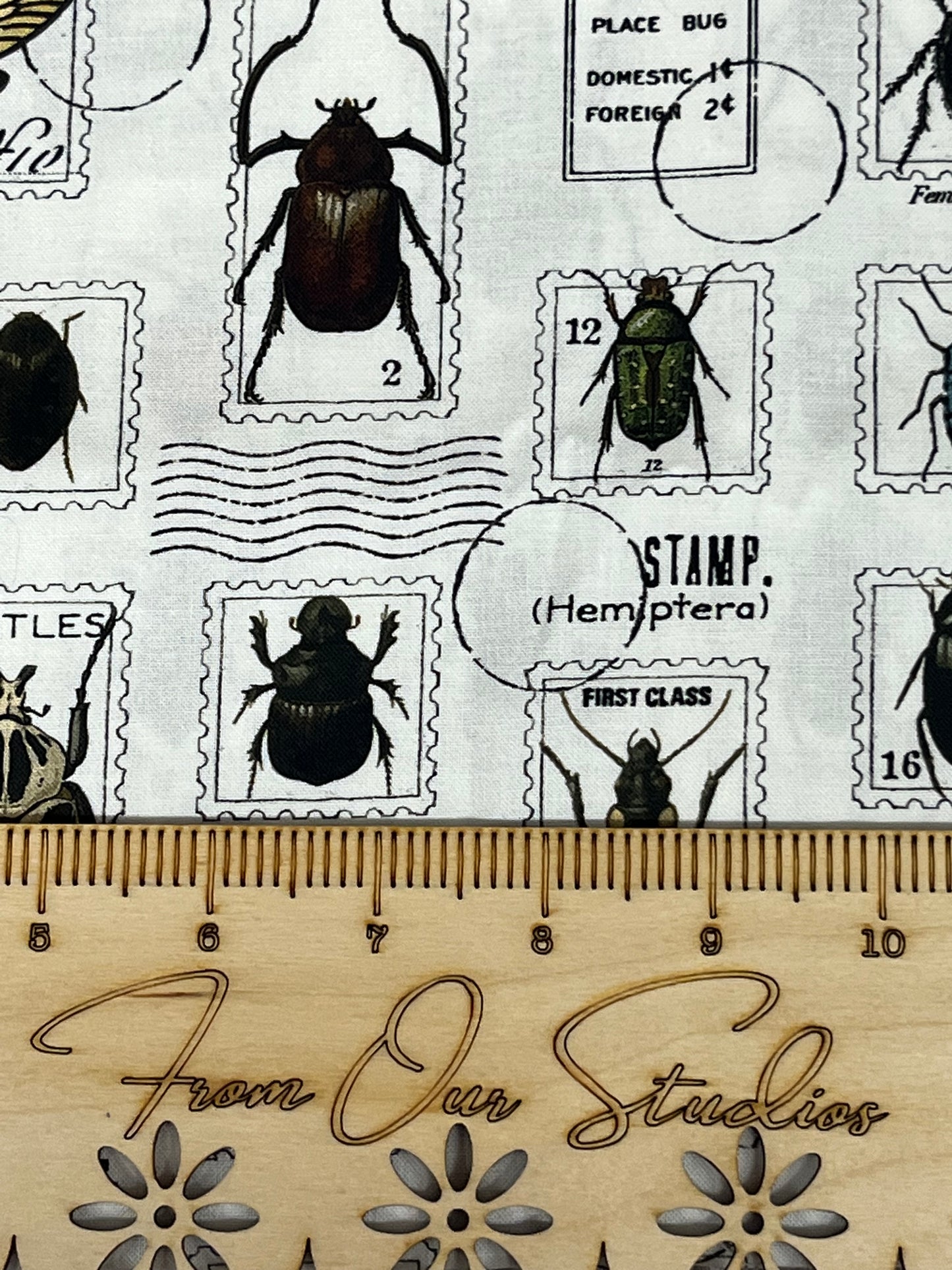 insect stamps on off white fabric riley blake