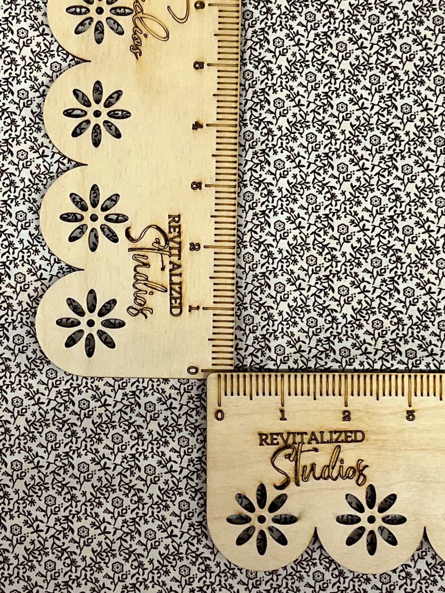 Close-up of Marshall Dry Goods 1800’s reproduction fabric, cream background with chocolate brown floral vines. 100% cotton fat quarter quilting fabric.