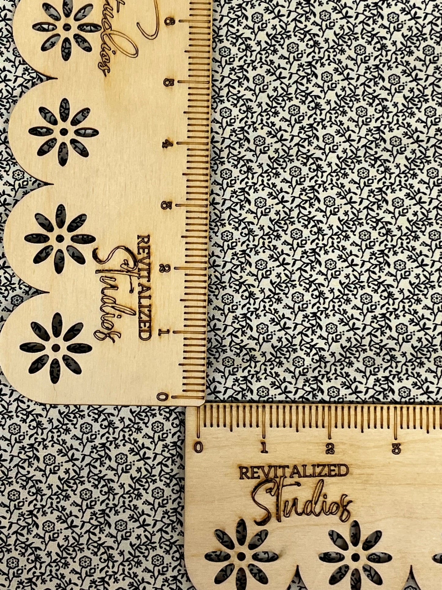 Cream background fabric with small black floral vines from Marshall Dry Goods, reproduction 1800’s collection. Fat quarter size, ruler not included.