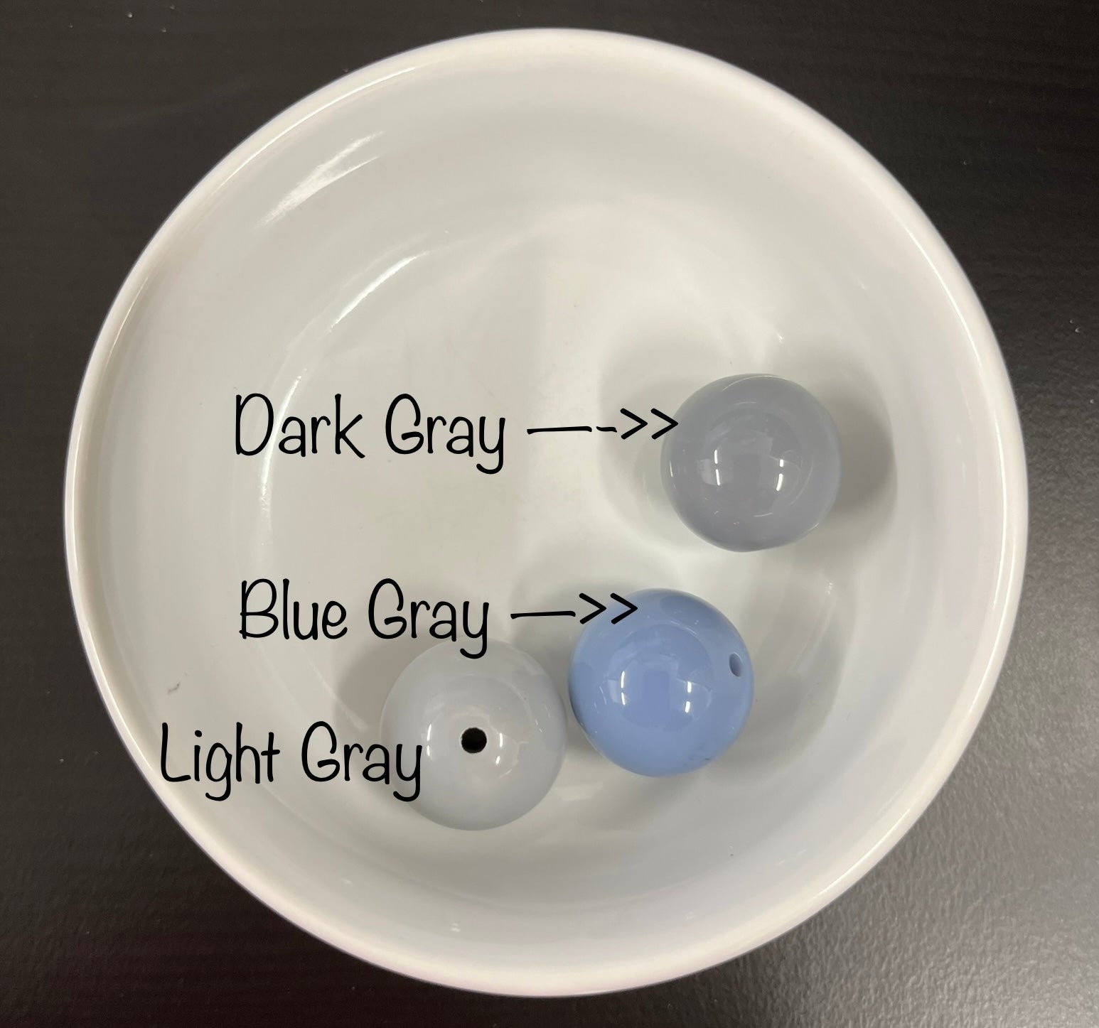 Three gray 20mm beads labeled 'Dark Gray', 'Blue Gray', and 'Light Gray' in a white bowl.