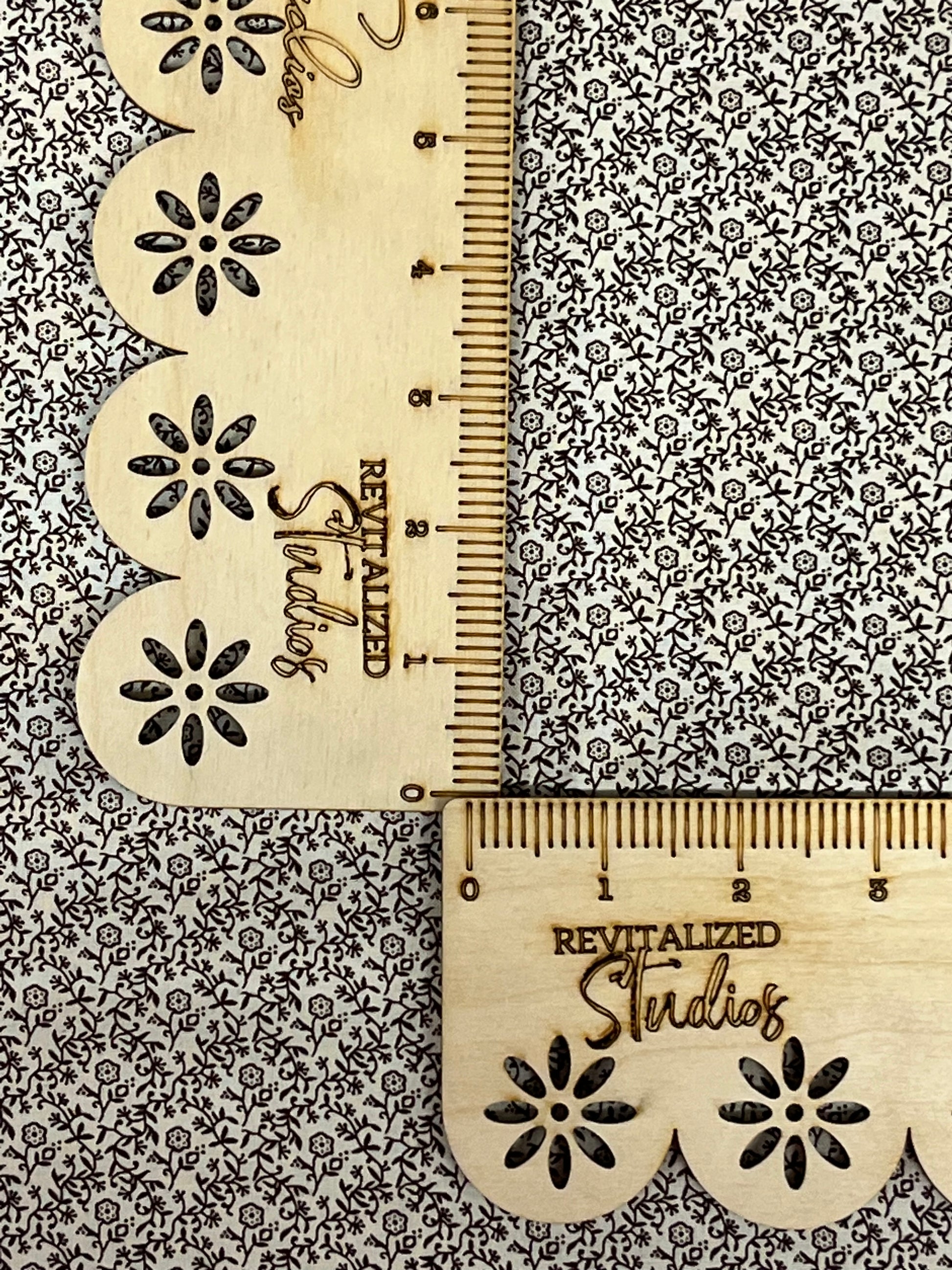 Close-up of Marshall Dry Goods 1800’s reproduction fabric, cream background with chocolate brown floral vines. 100% cotton fat quarter quilting fabric.