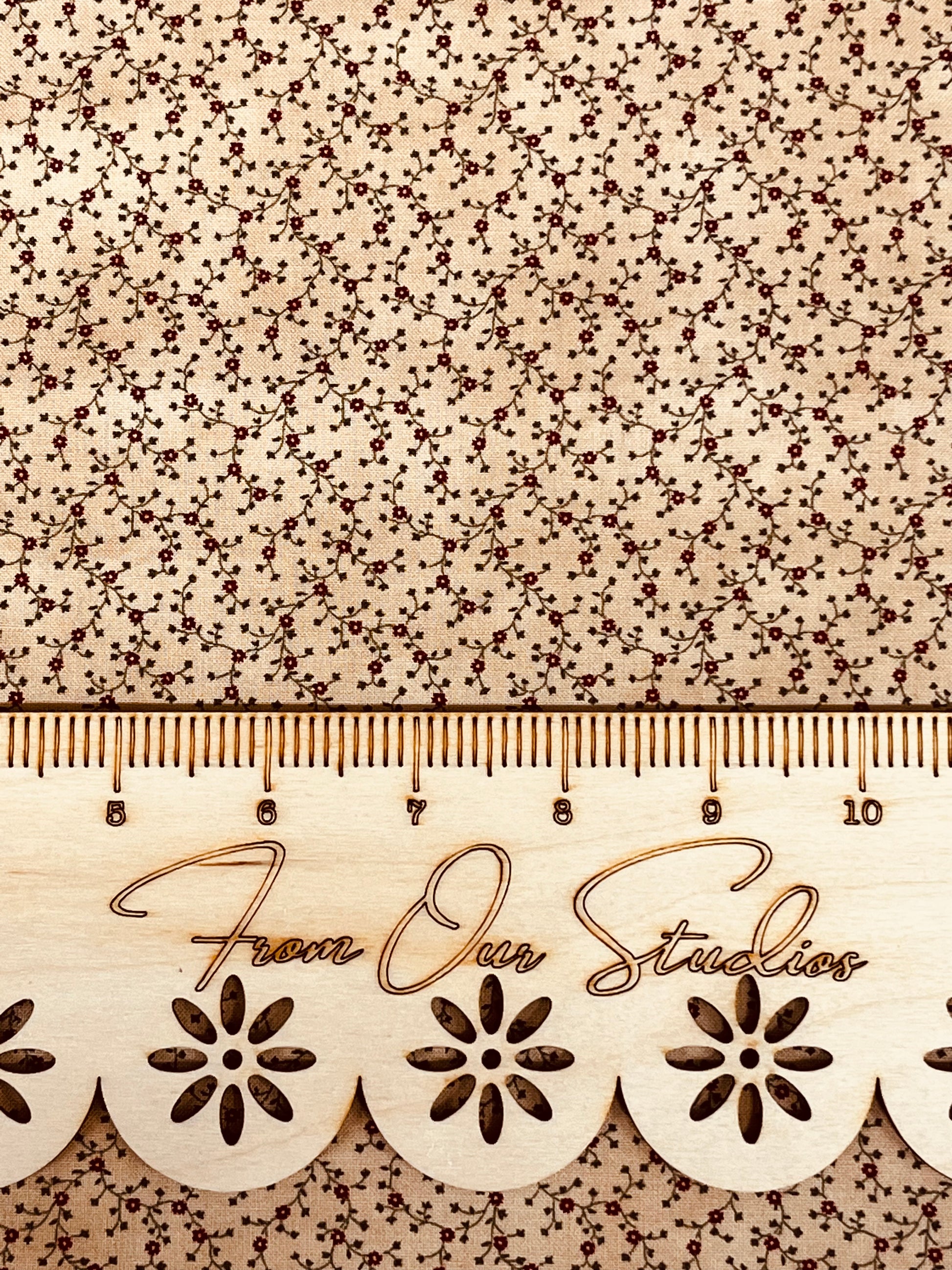 Closeup of Moda Harvest Home OOP fabric fat quarter with delicate tiny floral print, perfect for doll making, quilting, and vintage sewing projects.