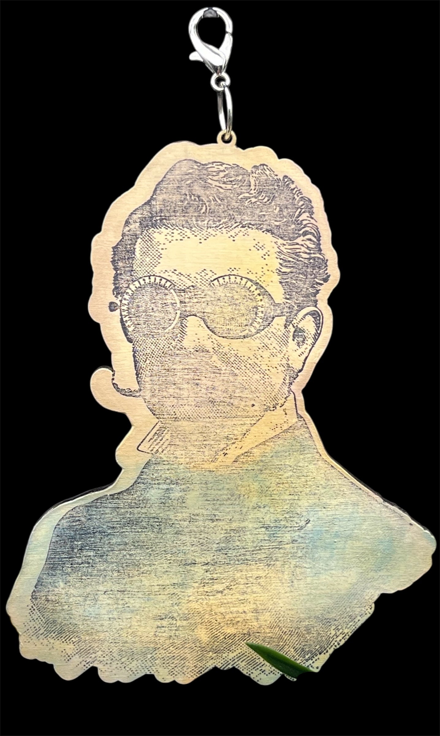 Laser cut birch wood charm featuring a steampunk gentleman with goggles, hand-painted and distressed for junk journal embellishments