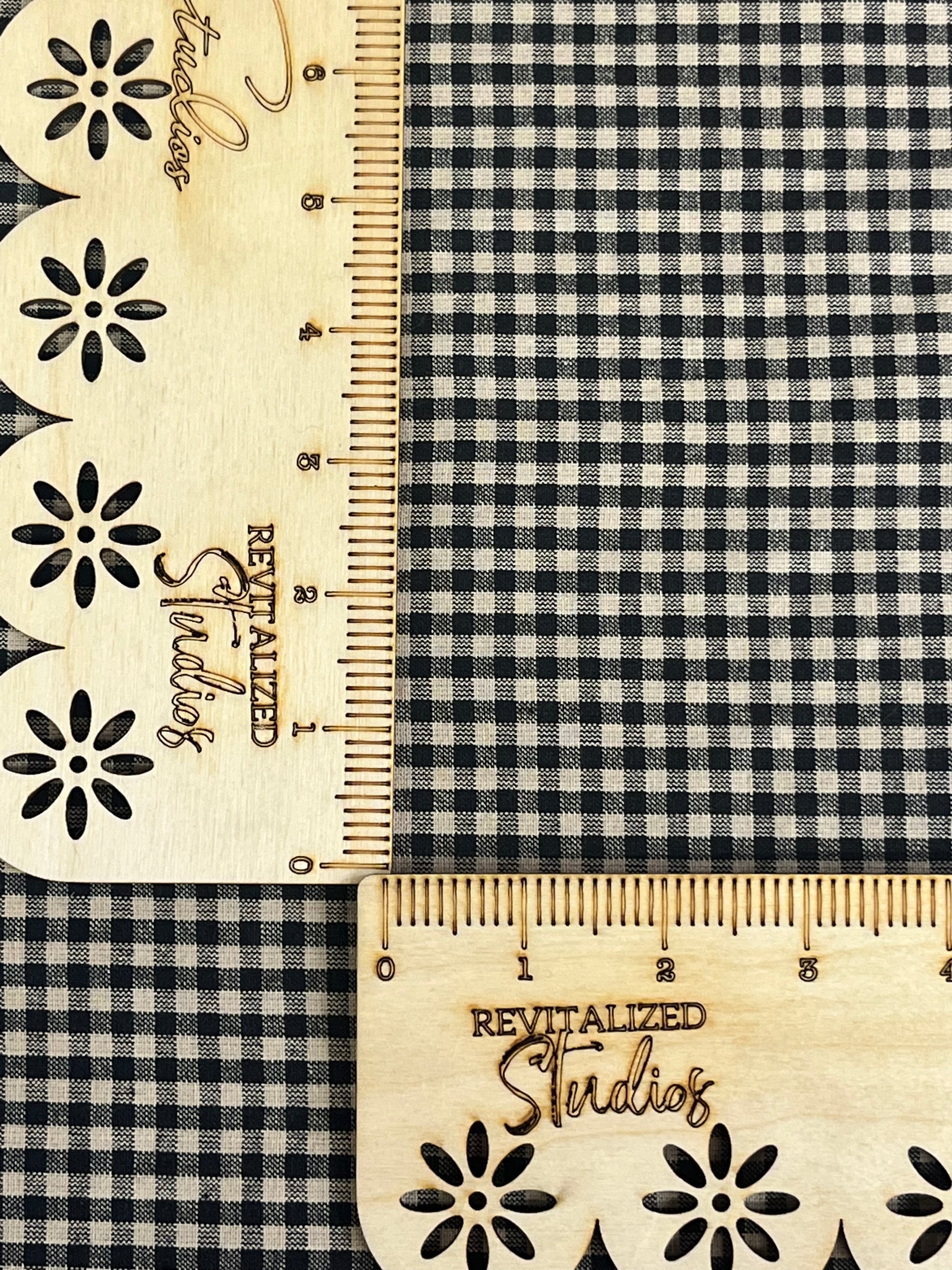 Close-up of tiny black and tan homespun check cotton fabric, ideal for quilting, primitive sewing, and doll making crafts.