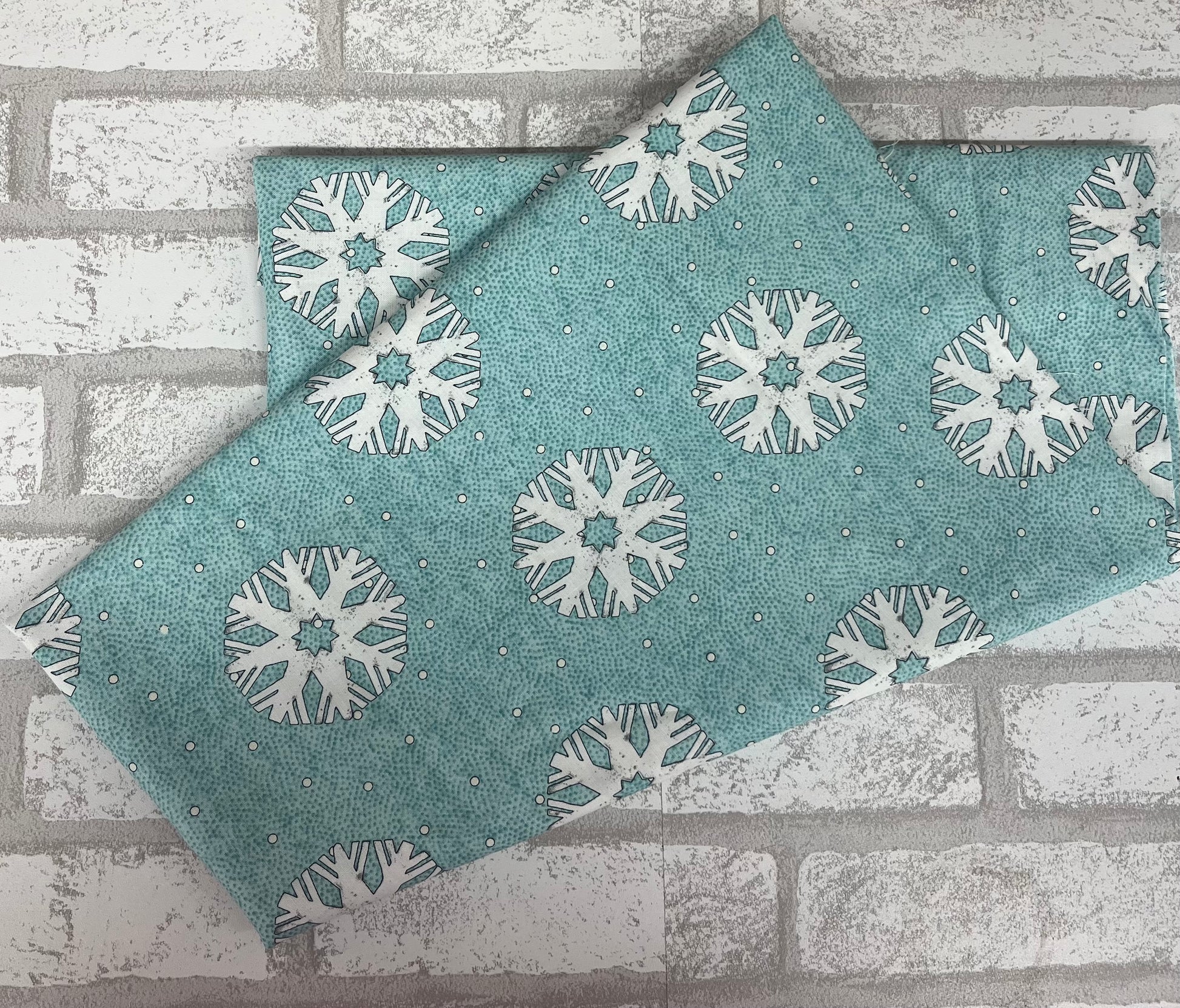 Blue Riley Blake fat quarter with scattered snowflakes, Nicholas Collection quilting fabric
