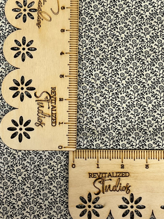 Cream background fabric with small black floral vines from Marshall Dry Goods, reproduction 1800’s collection. Fat quarter size, ruler not included.