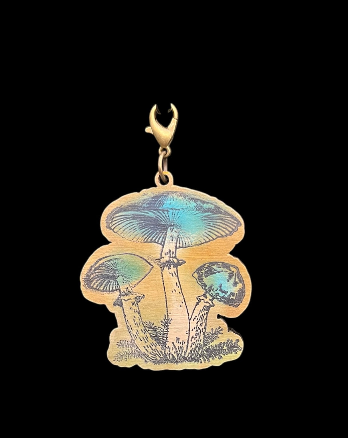 Hand painted vintage looking mushroom wood charm with teal accents for junk journaling and bag embellishment